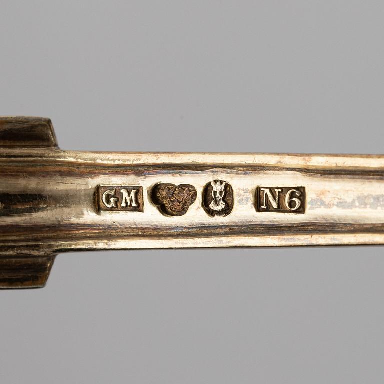 Firma Gustav Möllenborg, 6 skedar och 6 gafflar, förgyllt silver, Stockholm 1888-1891. Nyrokoko.