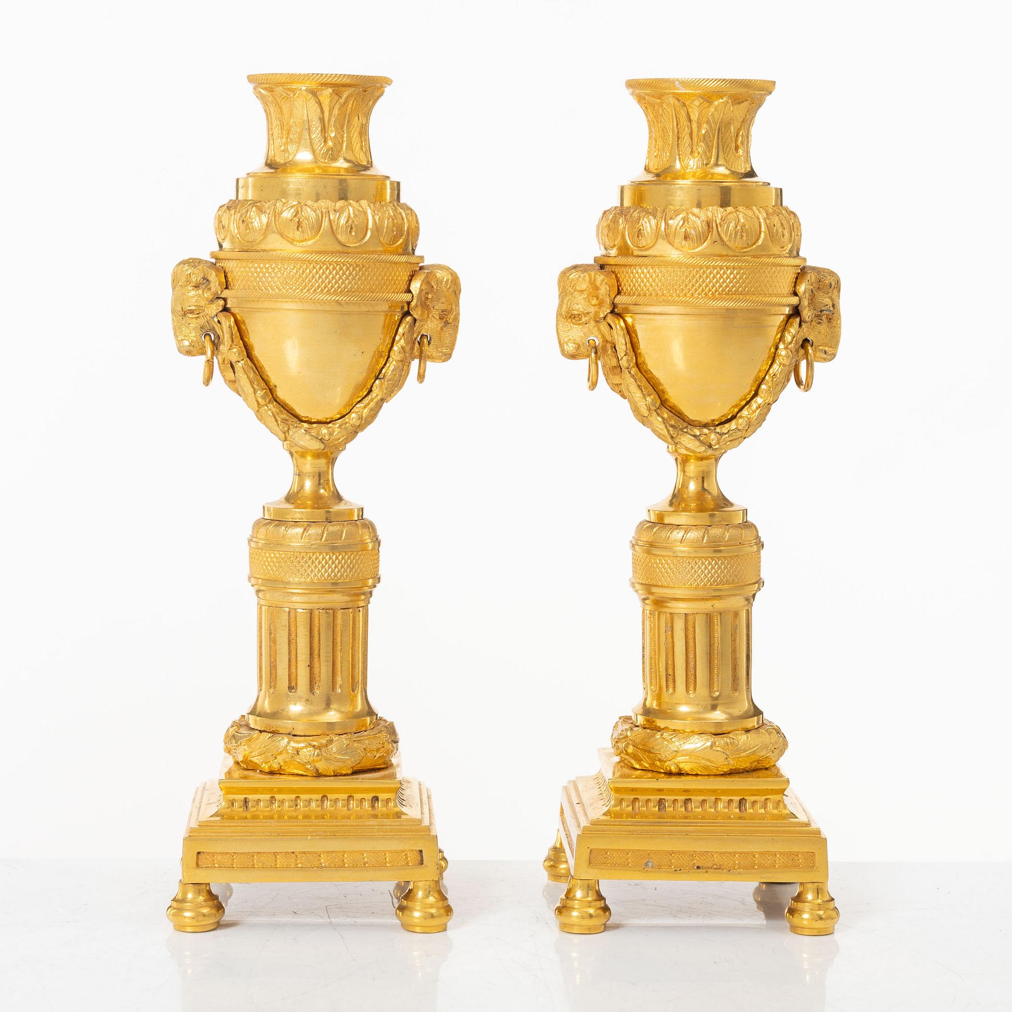 A pair of French Louis XVI style gilt-bronze casolettes, later part 18th century.