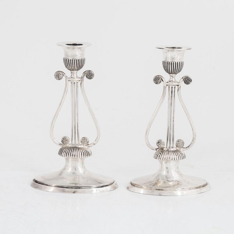 A pair of Swedish silver Empire candlesticks, mark of Gustaf Folcker, Stockholm 1814.