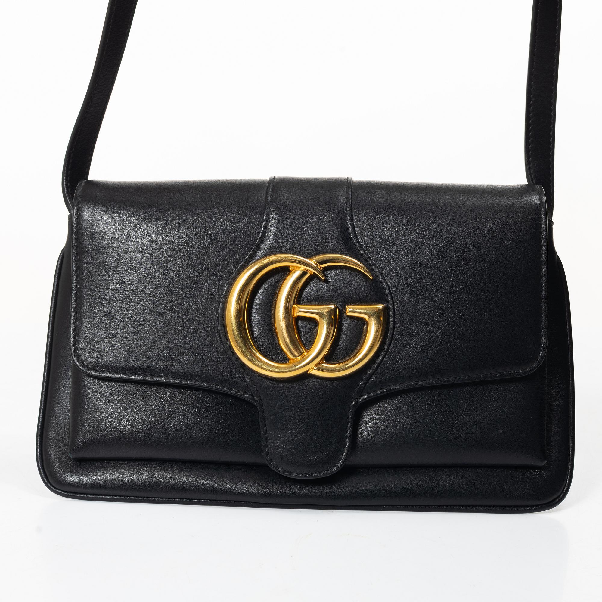 Gucci, a handbag.