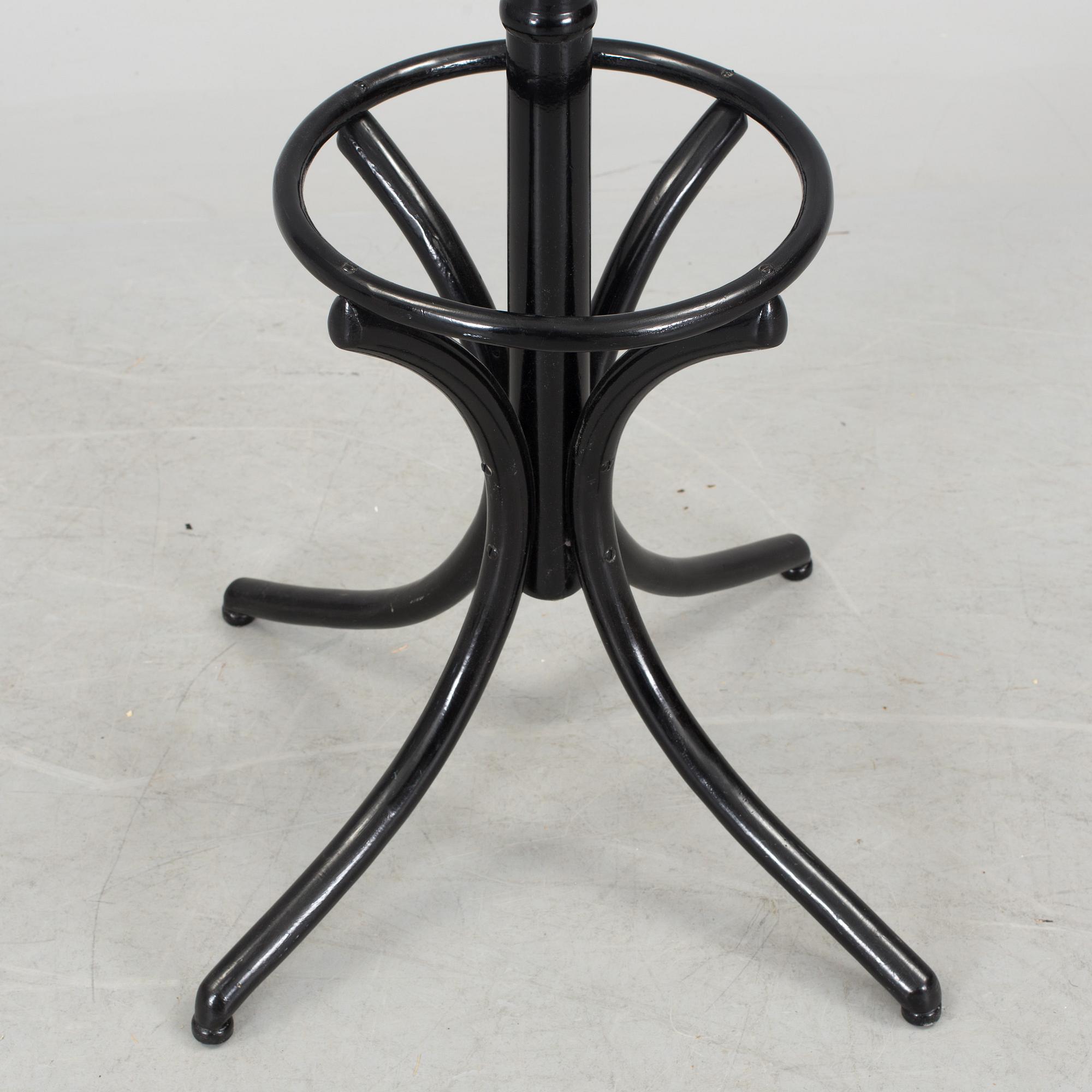 A 20th century wooden hat and coat stand.