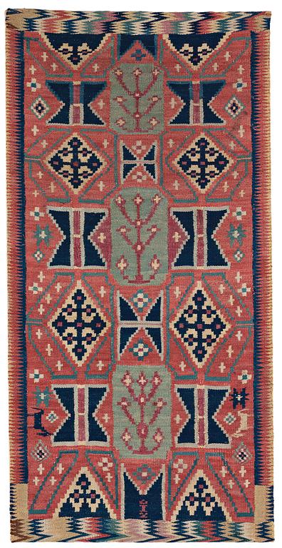 A CARRIAGE CUSHION, "Träd och timglas", double interlocked tapestry, ca 101,5 x 50,5 cm, Scania, Sweden,