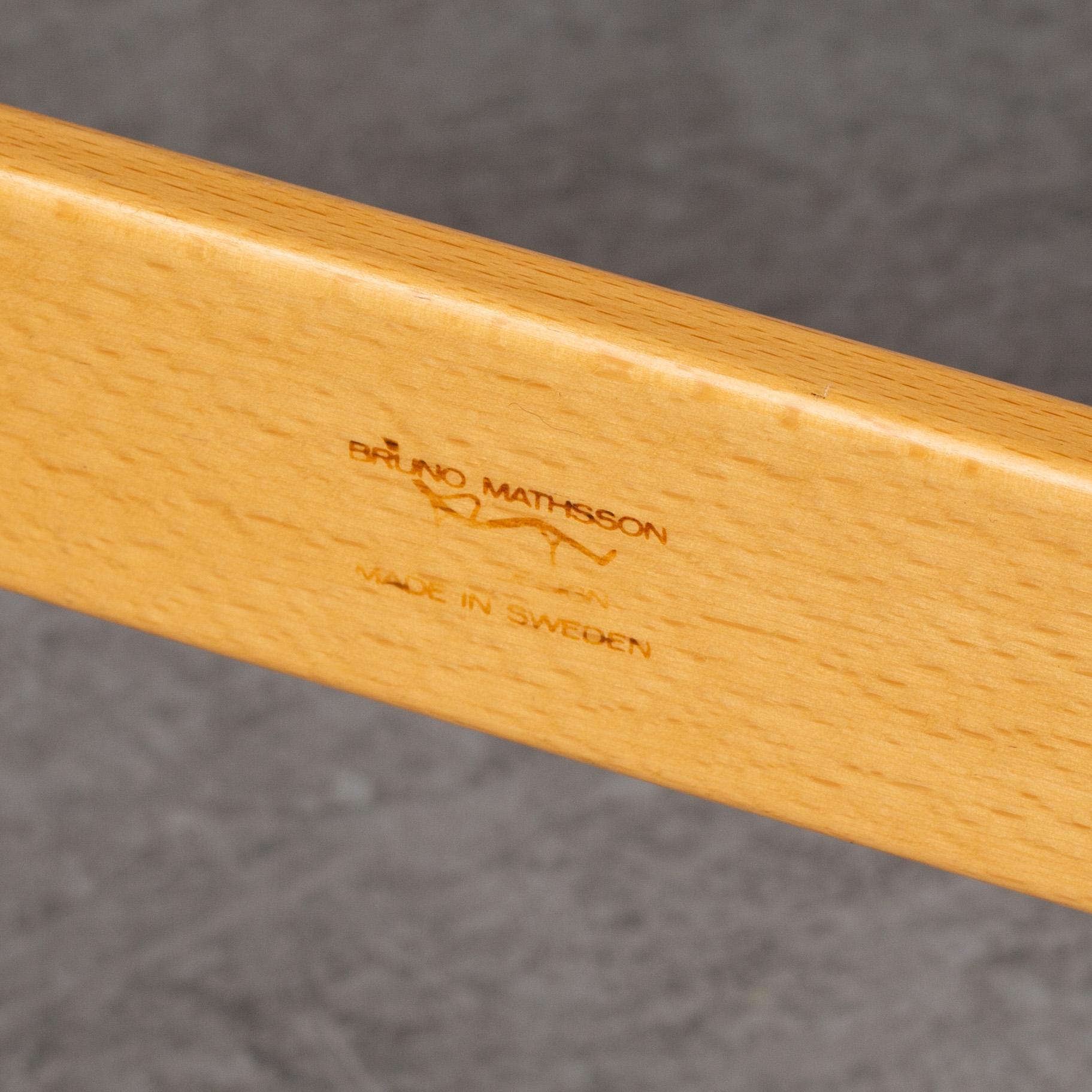 A pair of 'Mina' chairs designed by Bruno Mathsson, Bruno Mathsson International, Värnamo, Sweden.