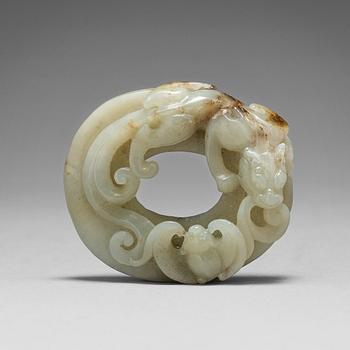 A nephrite sculpture of a Qilin dragon and a bat, Qingdynastin (1664-1912).