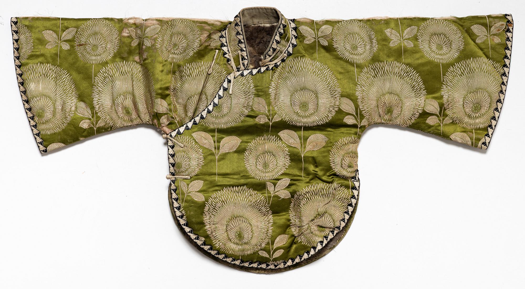 A Japanese silk brocade and fur childrens jacket, Meiji (1868-1912).