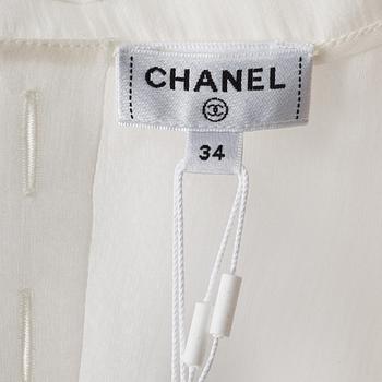 Chanel, a white silk blouse, french size 34.