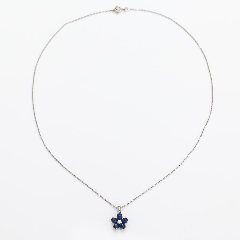 An 18K white gold necklace with sapphires and a diamond ca. 0.06 ct.