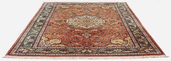 A part silk Tabriz carpet, c. 268 x 179 cm.