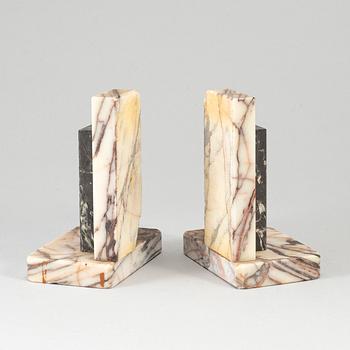 A pair of art déco marble book ends, 1930s.