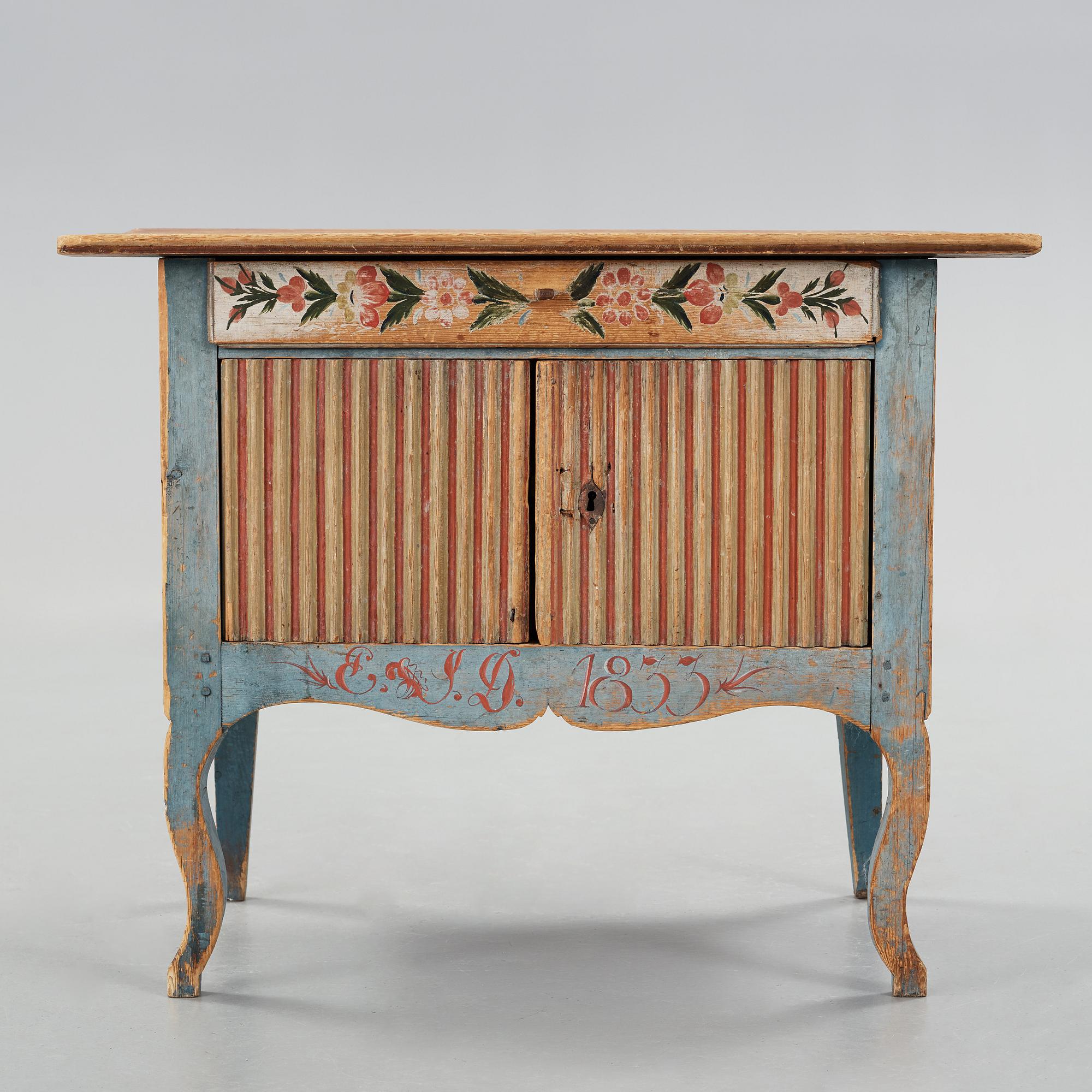 A painted pine table marked E.S.D 1833.