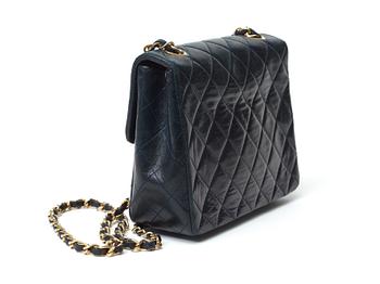 A 1970s black quilt leather shoulder bag by Chanel.