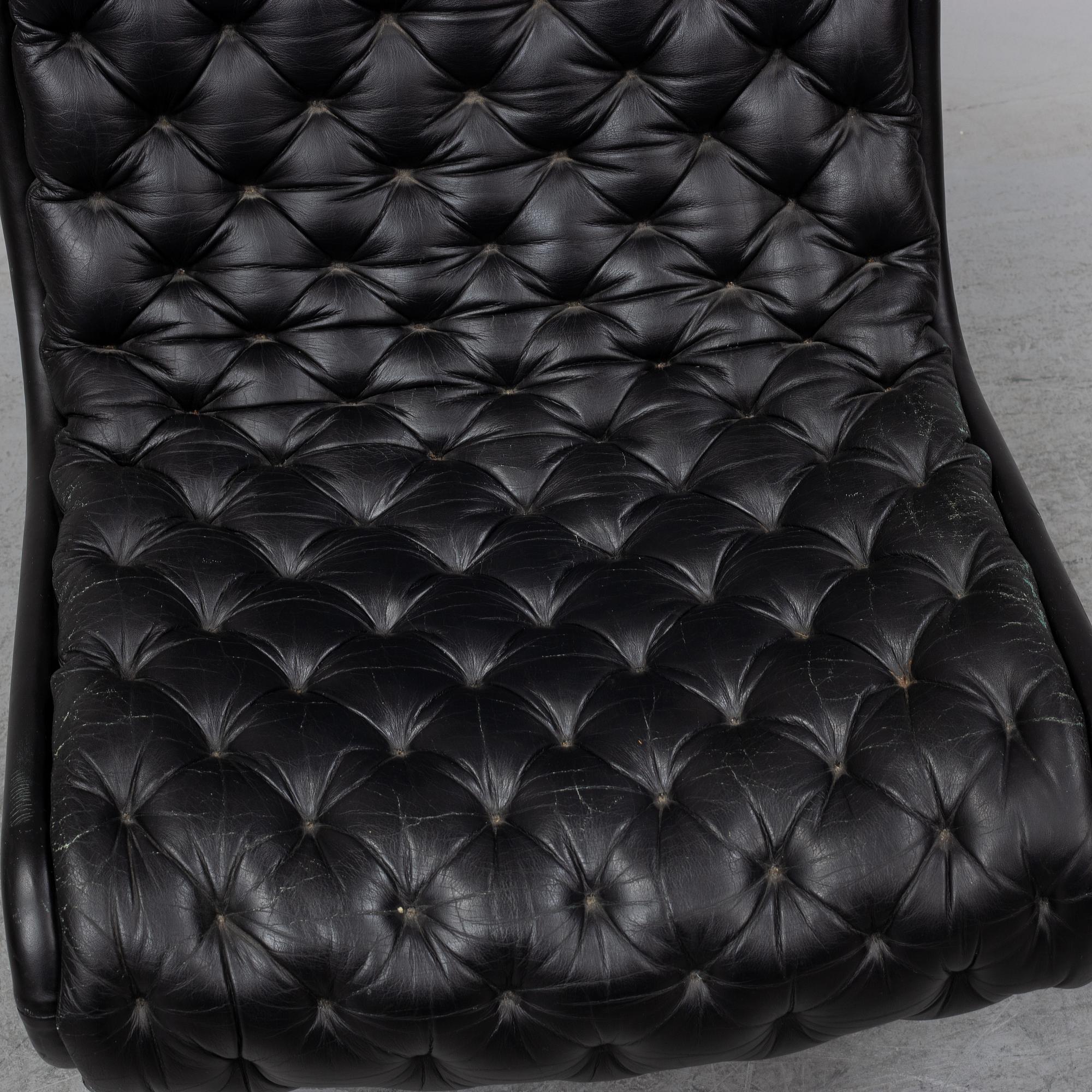 VERNER PANTON, a leather covered easy chair, 1970's.