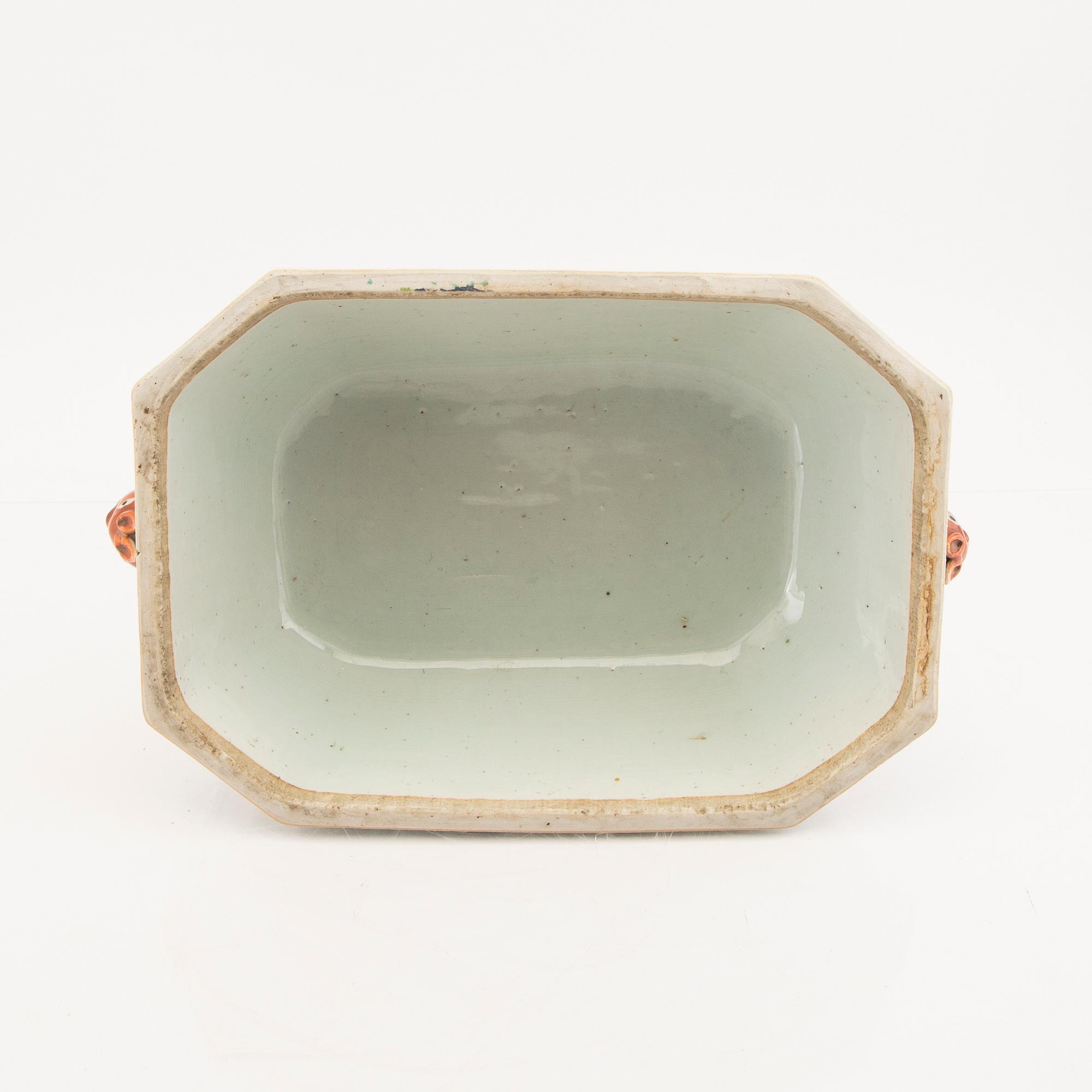 A Chinese famille rose tureen with cover and plate later part of the 18th century.