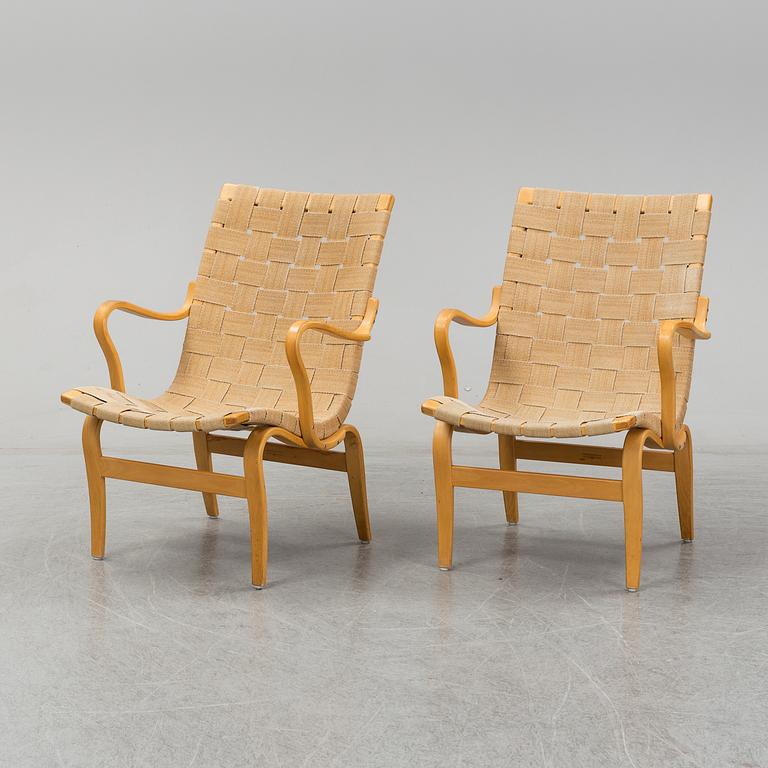 A pair of 'Eva' easy chairs by Bruno Mathsson, Firma Karl Mathsson, Värnamo 1973.