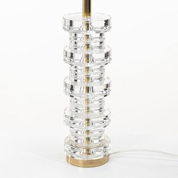 Carl Fagerlund, A table lamp in glass and brass, Orrefors.