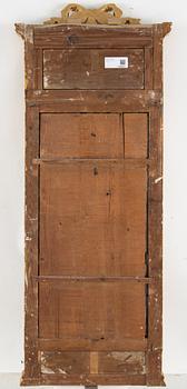 A 1700s Gustavian mirror.