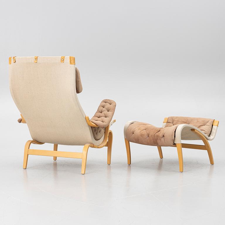 Bruno Mathsson, a 'Pernilla' armchair and ottoman, Dux.