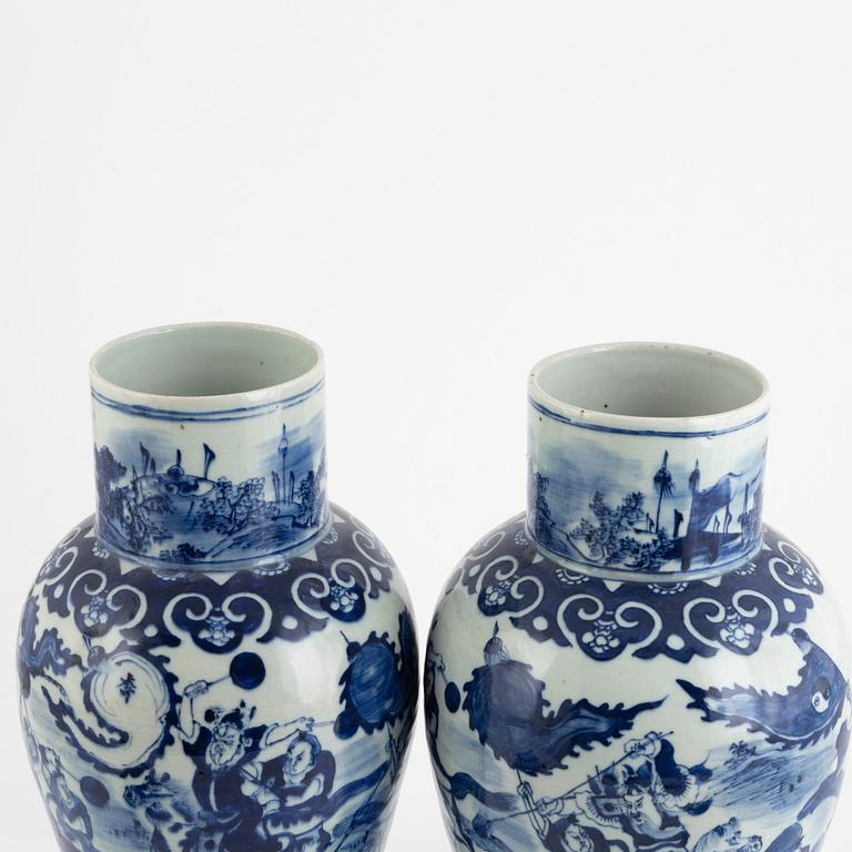 A pair of blue and white urns with covers, China, 19th century.