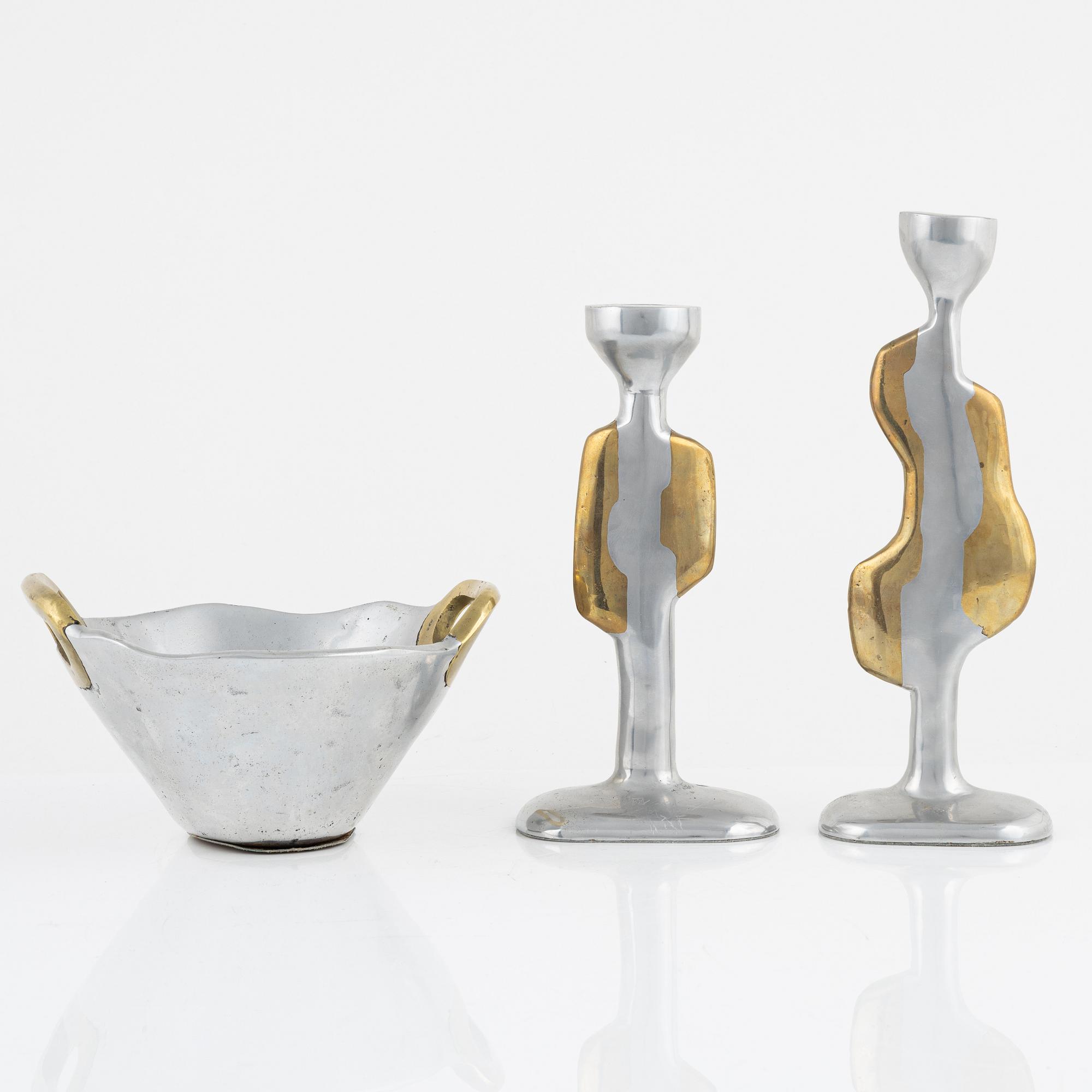 David Marshall, a metall and brass bowl and a pair of candle sticks.