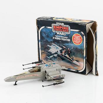 Star Wars, a set of 23 action figures and vehicles, 1970's/80's.