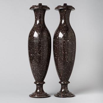 A pair of Swedish late Empire 19th century porphyry urns.