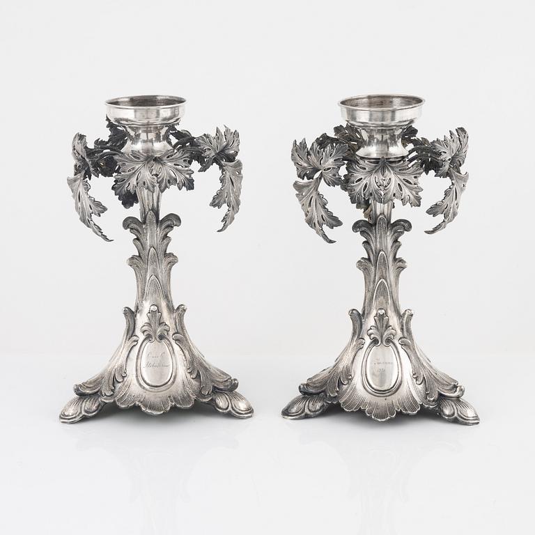 A pair of Russian silver candelabra, with Swedish importmarks, second half of the 20th century.