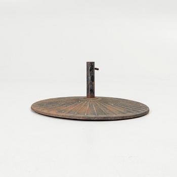 Parasol base, cast iron, early 20th century.