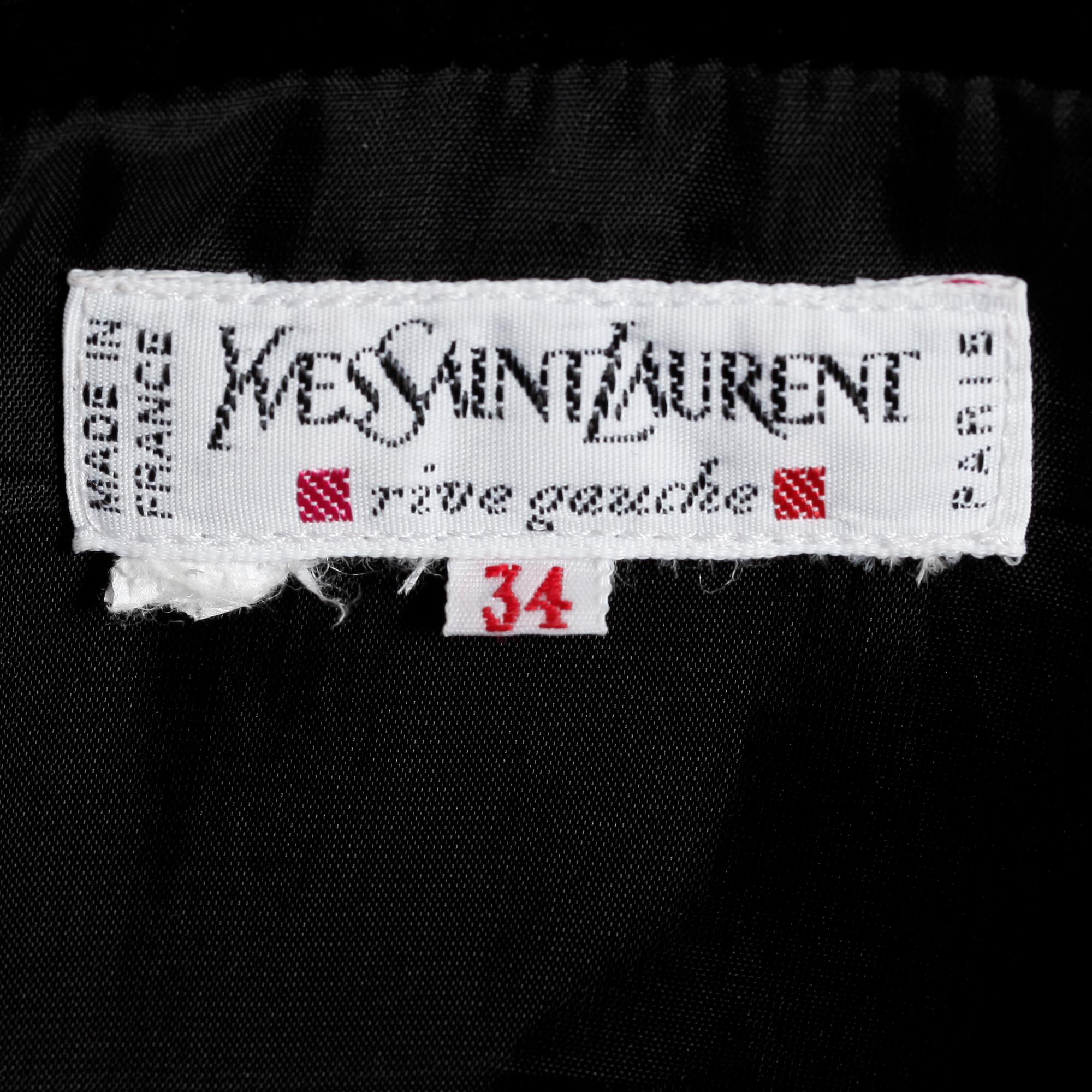YVES SAINT LAURENT, a black velvet dress.