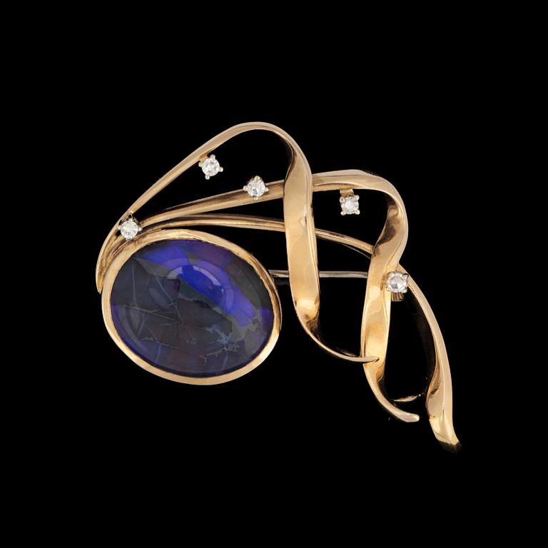 A opal and diamond brooch.