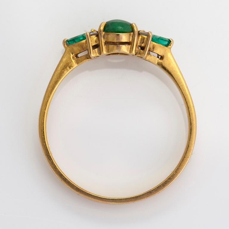 Earrings and ring, 18K gold with jadeite, emeralds, and small diamonds.