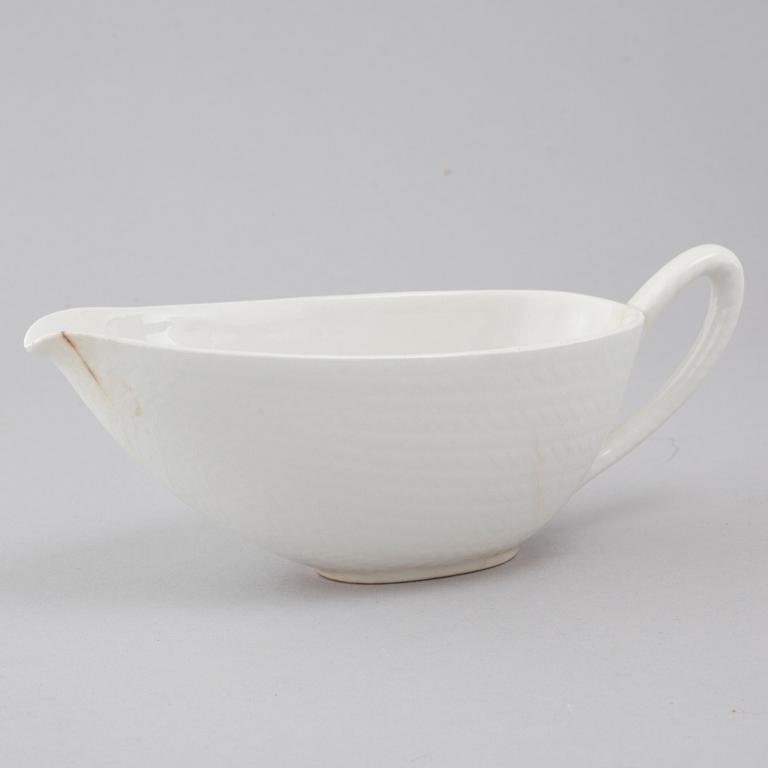 34 pieces of porcelain tableware by Hertha Bengtson for Rörstrand, model "Blå eld", second half of the 20th century.