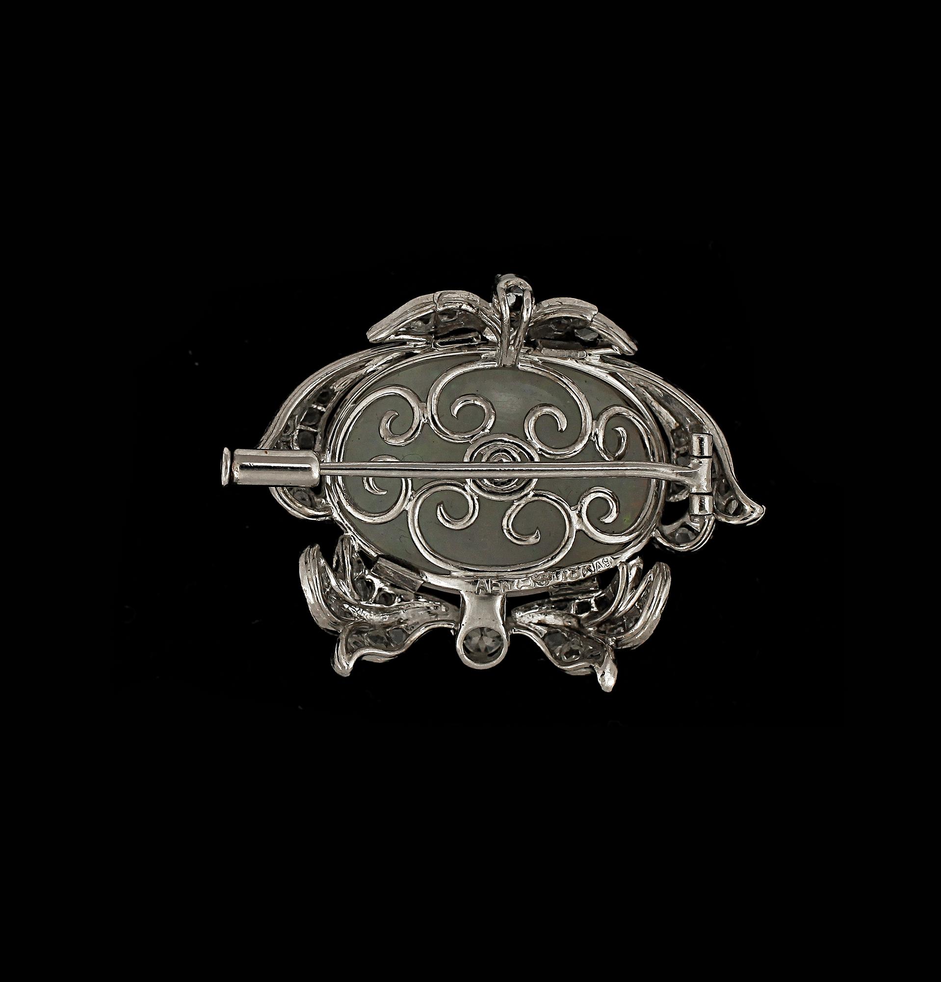 BROSCH, 18k vitguld, opal samt briljantslipade diamanter. Vikt ca 8 g.