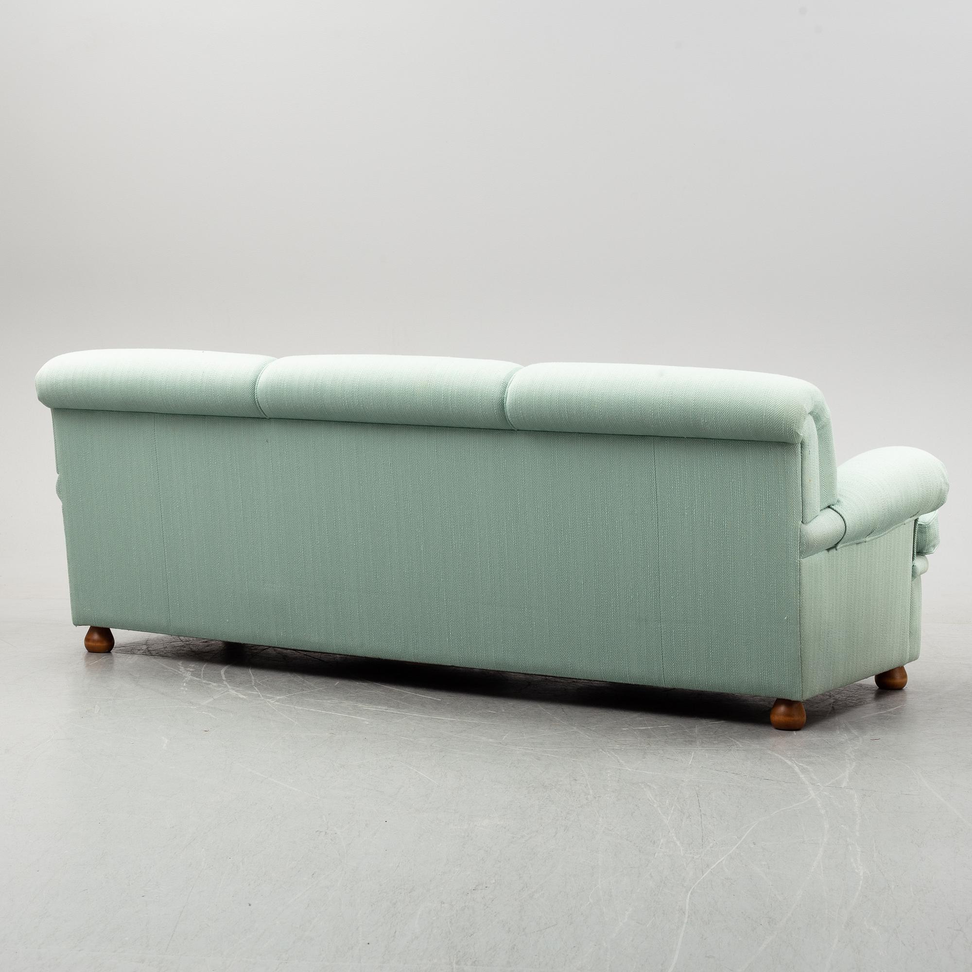 A model 703 sofa by Josef Frank for Firma Svenskt Tenn.