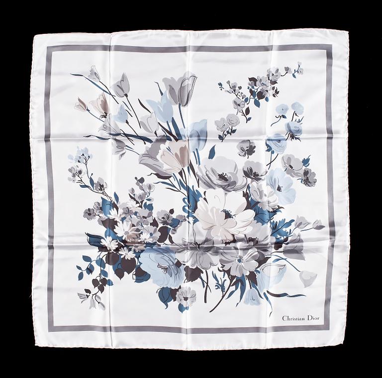 A set of three scarves by Christian Dior, Emilio Pucci and Yves Saint Laurent.