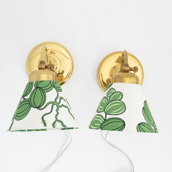 A pair of brass wall lights, Ivars, Sweden, mid 20th Century.