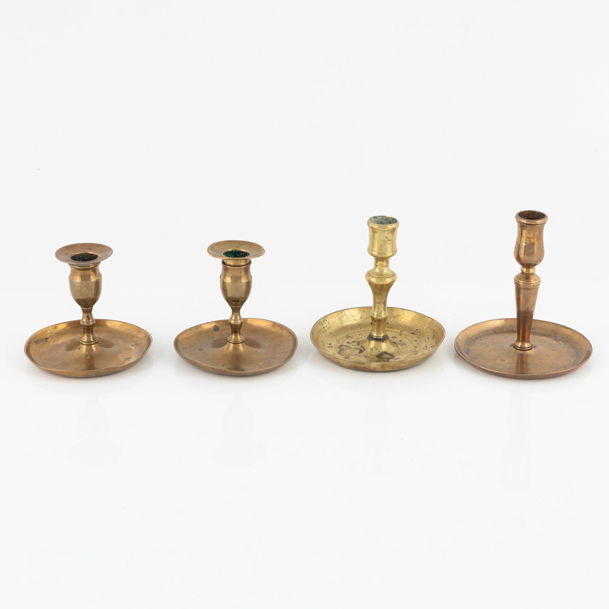 Four bronze candlesticks, a pair of which Skultuna model N 60, 18th-19th Century.