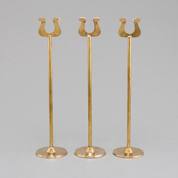 10 CARD STANDS, brass, 20th century.