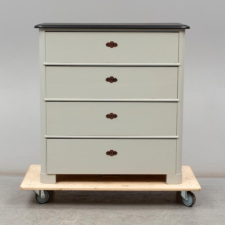 A late 19th century painted chest of drawers.