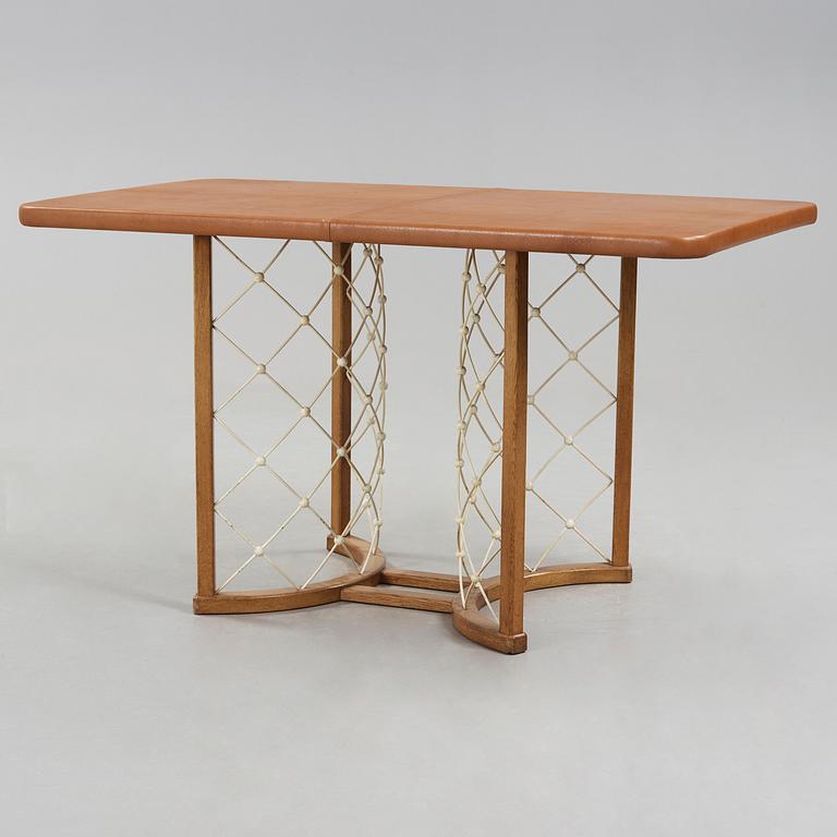 A modernist oak based table, 1940-50's.