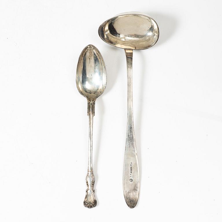 A Swedish silver soup ladle and a serving spoon, 19th Century.