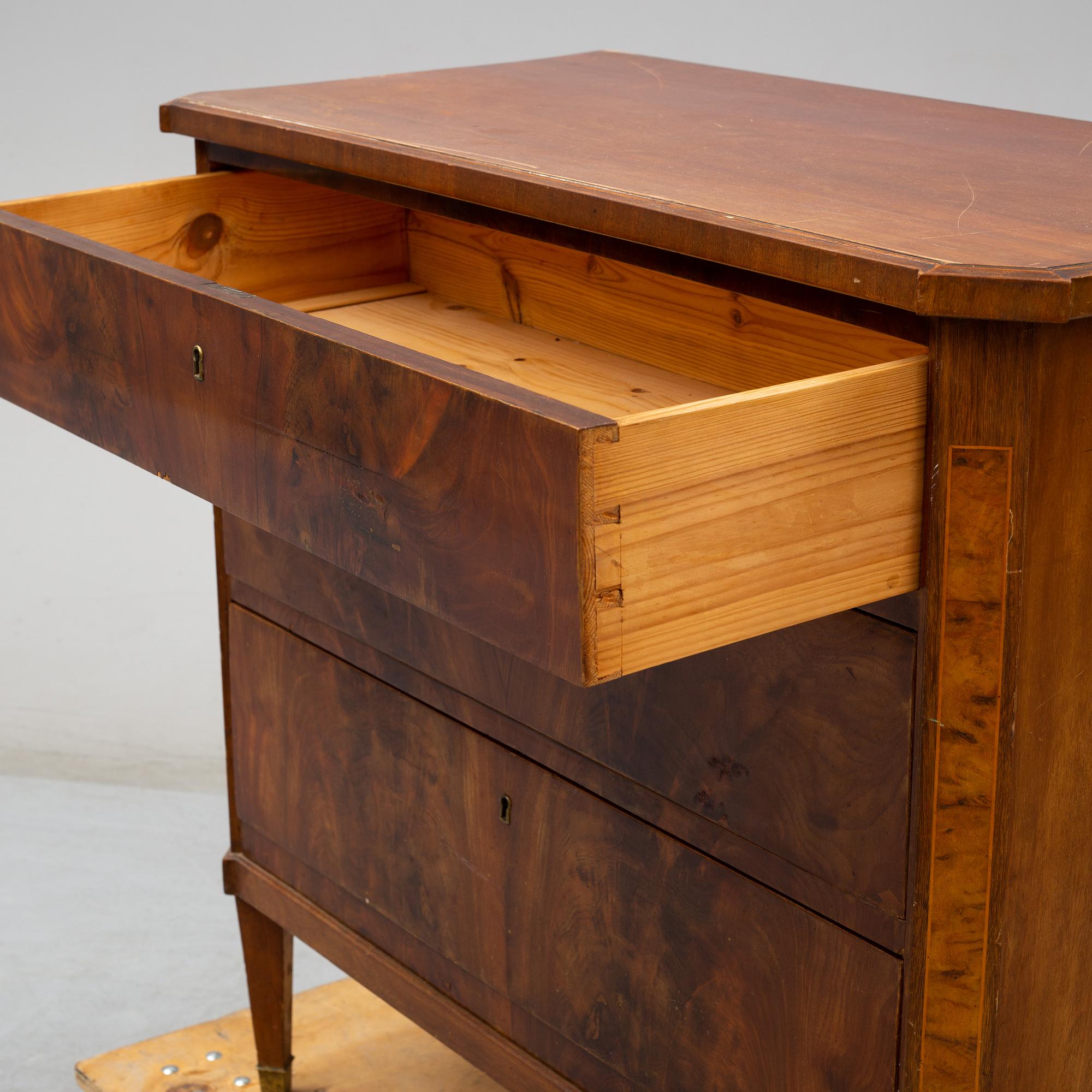 A Gustavian style chest of drawers, late 19th century.