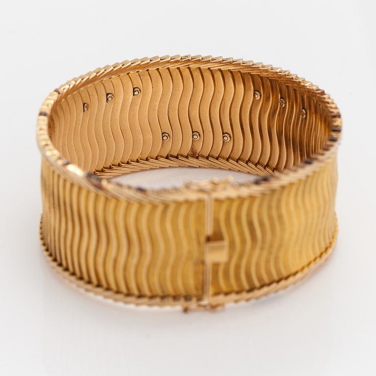 Armband, 18K guld, safirer, smaragd, diamanter ca 0.075 ct  tot. Importstämplat Koruteollisuus Tillander, 1962.