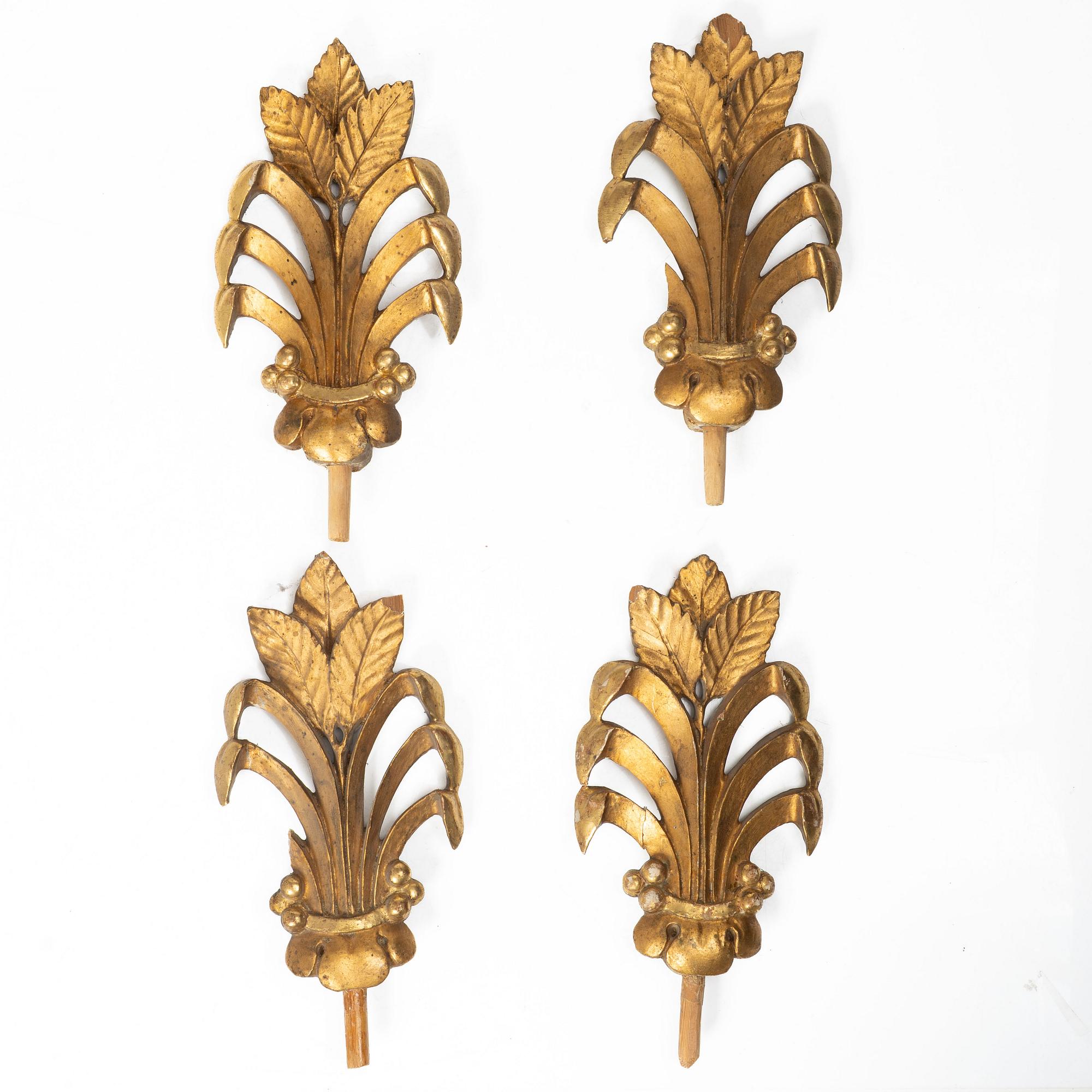 Two pairs of curtain-rod finials, early 19th Century.
