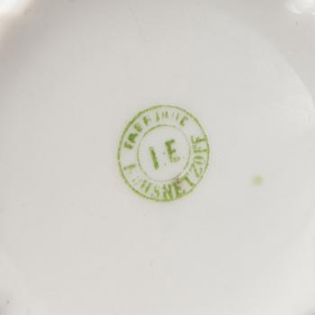 A set of four Kuznetsov porcelain coffee cups with saucers, export marked Fabrique Kousnetzoff, 1890-1913.