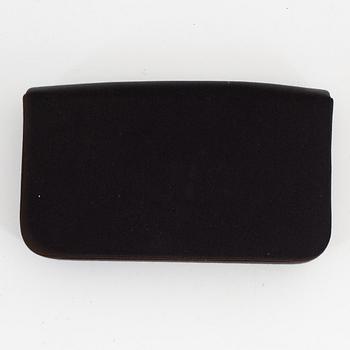 Prada, a black satin clutch.