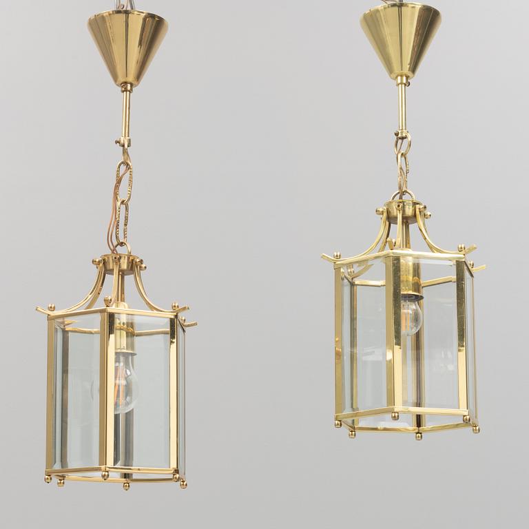 A pair of ceiling lights, later part of the 20th Century.