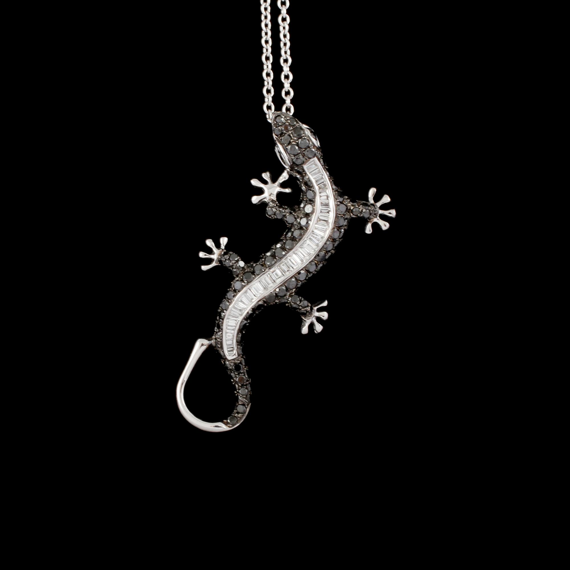 HÄNGE, 18k vitguld med baguettslipade diamanter samt svarta briljantslipade diamanter, totalt 1.20 ct. Vikt 6 g.