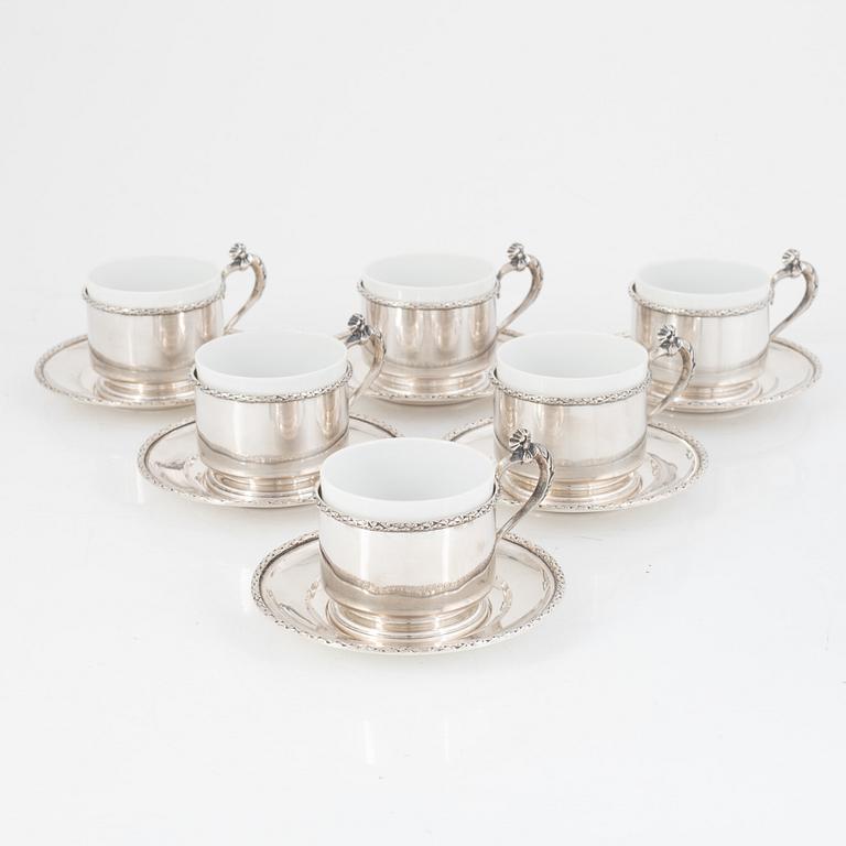 Silver tea mug holders with saucers, Pest, Austria, around 1900.