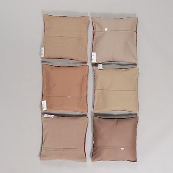 Six kelim pillows.