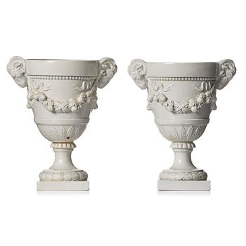 455. A pair of large white glazed urns, possibly, 19th century.